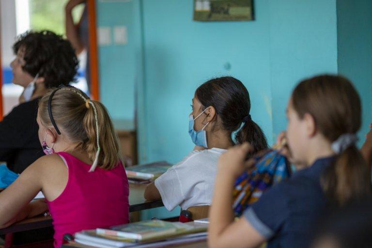 Students in classroom wearing masks