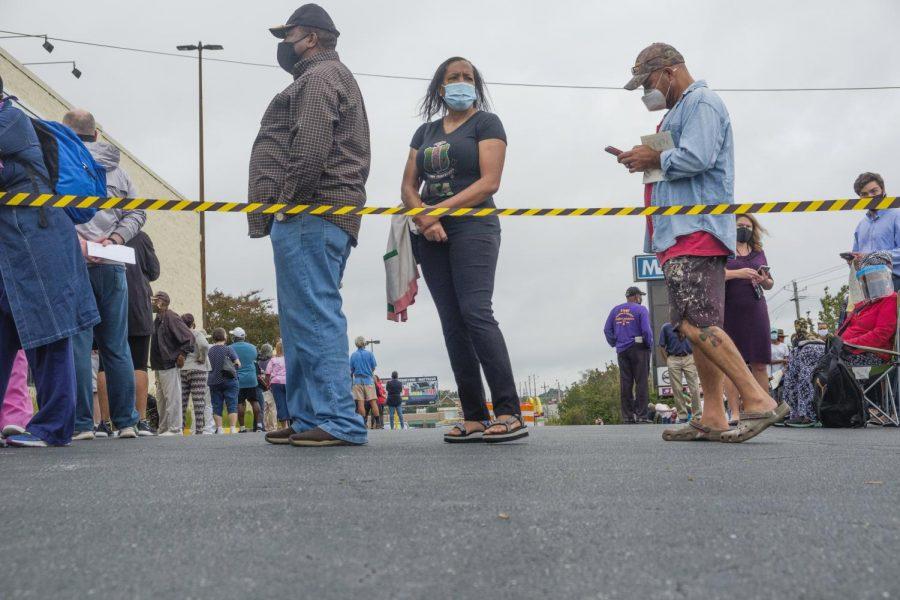 Voters wait in line at the Macon-Bibb County Board of Elections during early voting in the 2020 Presidential Election.