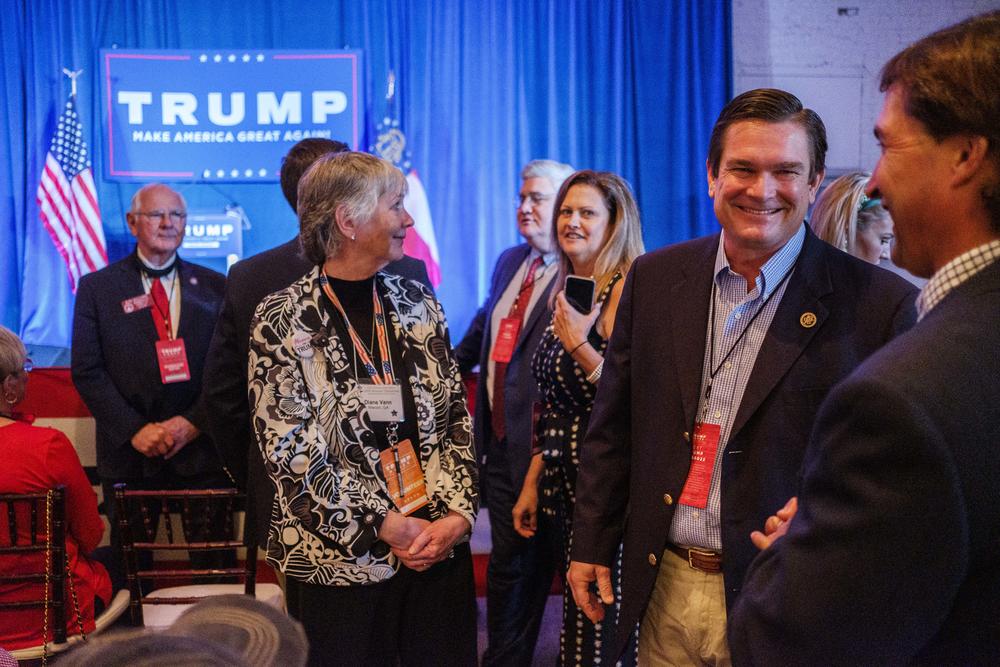 House Rep. Austin Scott, R GA-08, second from right, during a campaign visit to Macon by Donald Trump Jr. in October. According to the Atlanta Journal-Constitution, Scott has tested positive for the coronavirus.