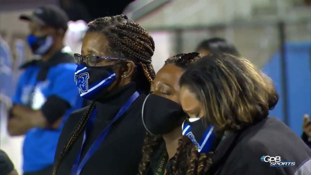 Westlake honors their principal during their football game