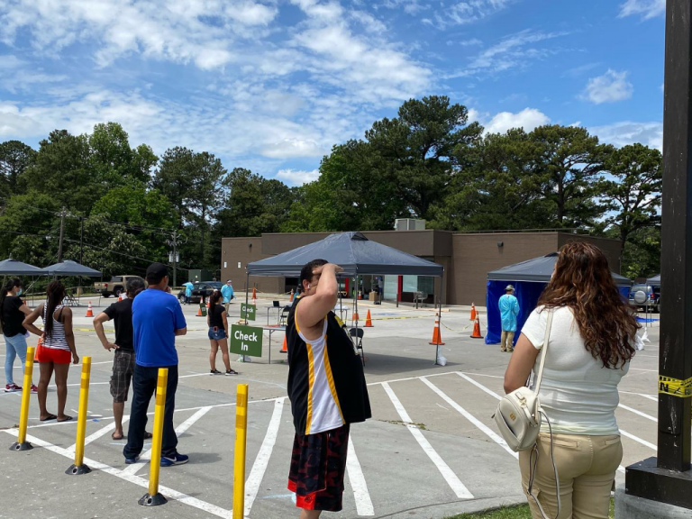 The Latino Community Fund and CORE Response operate a COVID-19 testing site off Buford Highway in Atlanta. Experts say a successful COVID-19 vaccination distribution plan needs to include paths to ensure the vaccine gets to people who need it most.