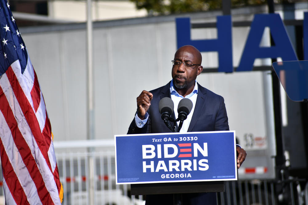 Democrat Raphael Warnock is the leading candidate in a 20-person special election for the seat currently held by Sen. Kelly Loeffler.