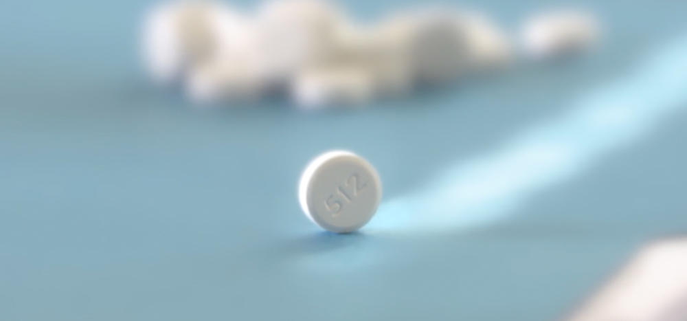 A pill with a 512 imprint.