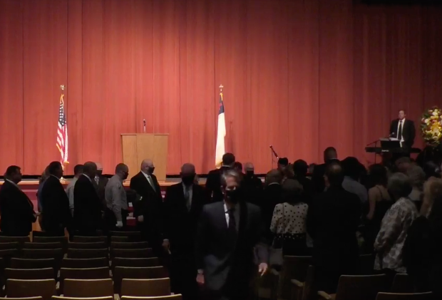 Gov. Kemp leaves funeral for DNR employee