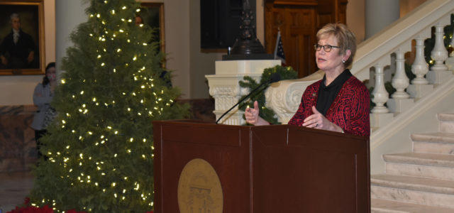 Dr. Kathleen Toomey addresses the media Tuesday