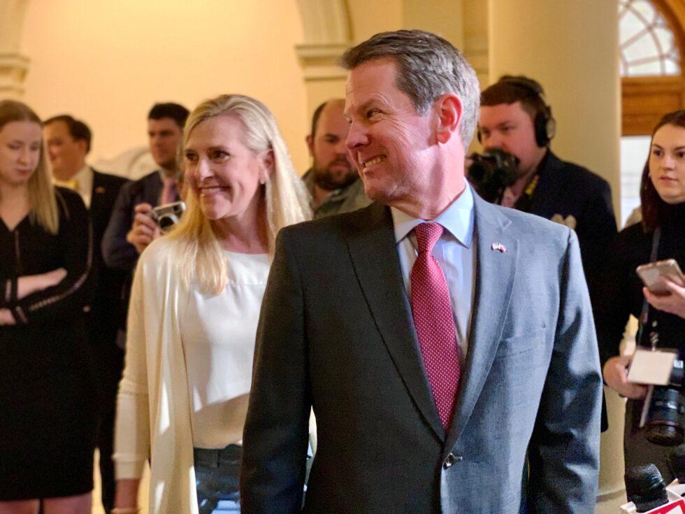 Gov. Brian Kemp and first lady Marty Kemp are on hand U.S. Sen. David Perdue speaks at the State Capitol for the first day of qualifying for the 2020 election on March 2, 2020.