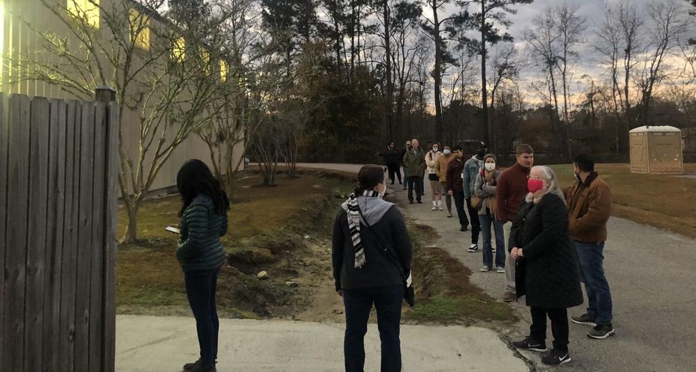 Voters in Pooler, one of the fastest growing towns in Georgia, got in line before sunrise this morning to go to the polls, a fitting way to start this U.S. Senate runoff election.