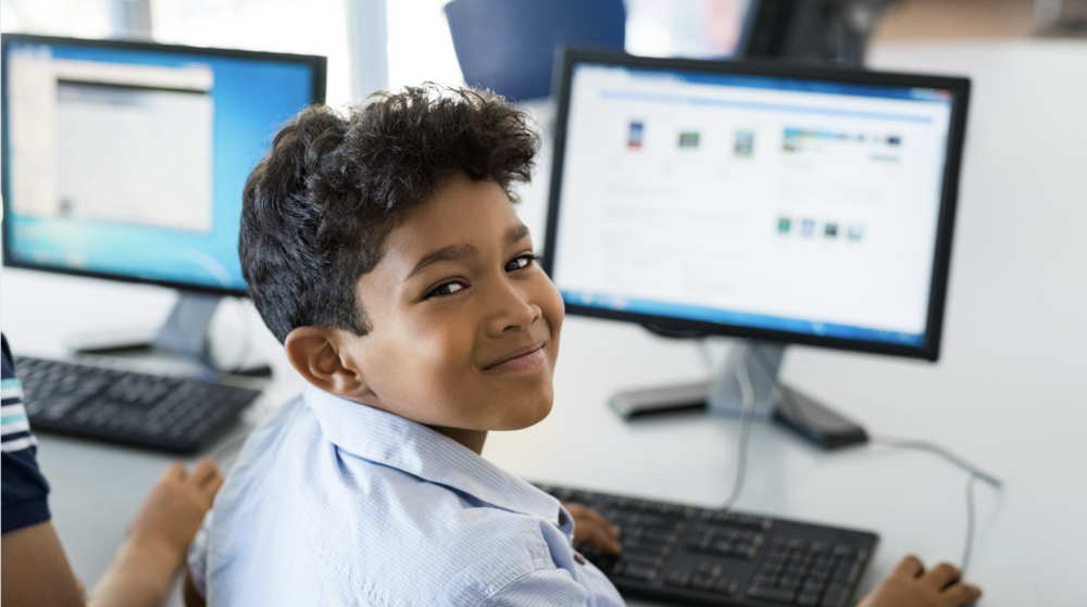 student in front of computer