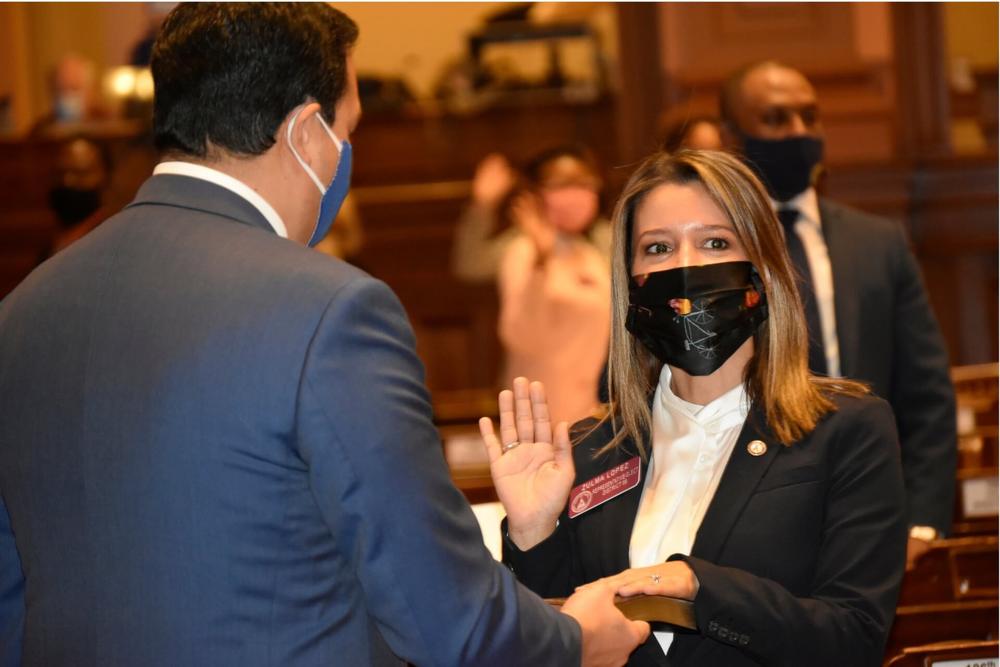 Freshman State Rep. Zulma Lopez, a Dekalb Democrat, takes the oath of office.