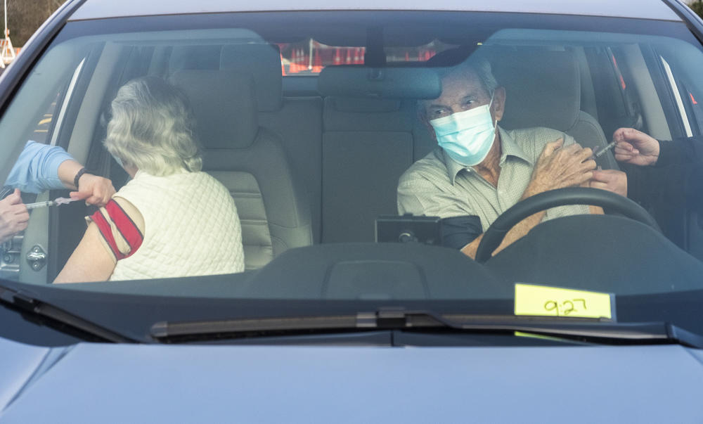 Marian, left, and Charlie Keen get vaccinated against COVID-19 on Cochran, Ga. in January 25, 2021.  