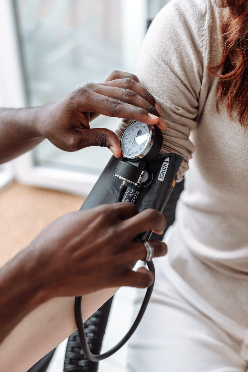 Person getting blood pressure taken