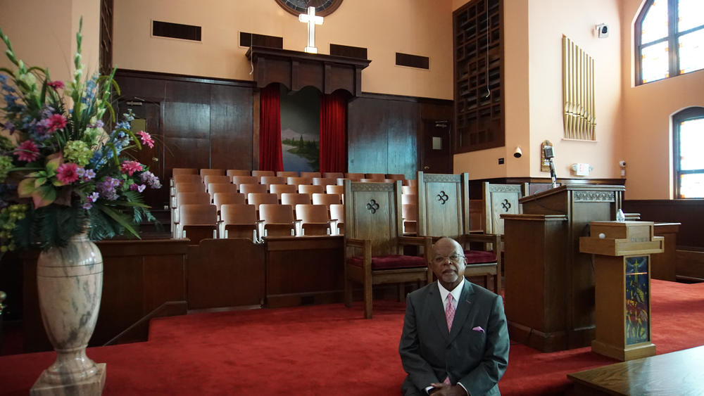 Host, Henry Louis Gates Jr. inside of Historic Ebenezer Baptist Church in Atlanta, GA.