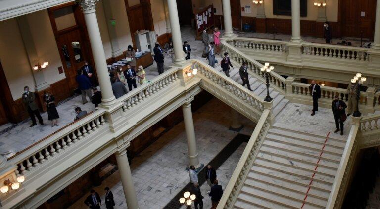 Lawmakers and lobbyists often rub elbows in the halls of the Georgia Capitol. A bill that would make it easier for those lobbyists to give lawmakers money during legislative session awaits Gov. Brian Kemp's signature.