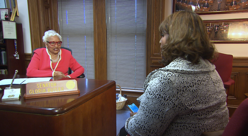 Georgia state Sen. Gloria Butler, left, speaks with Donna Lowry.