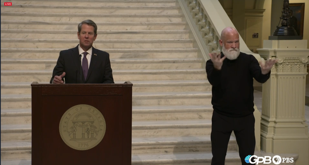 Gov. Brian Kemp and ASL interpreter David Cowan