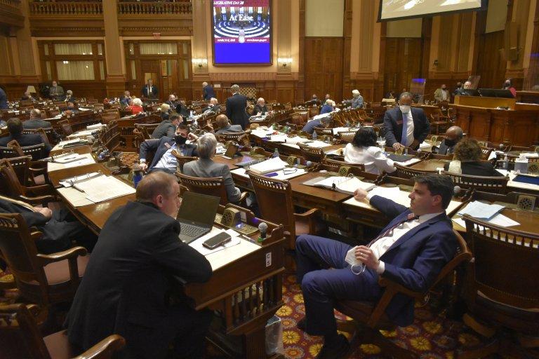 State lawmakers Monday completed a socially distanced Crossover Day 2021, narrowly pushing ahead a bill with major voter restrictions and unanimously approving one that would repeal Georgia's citizen's arrest law.