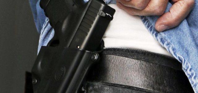 Stock photo of gun in holster