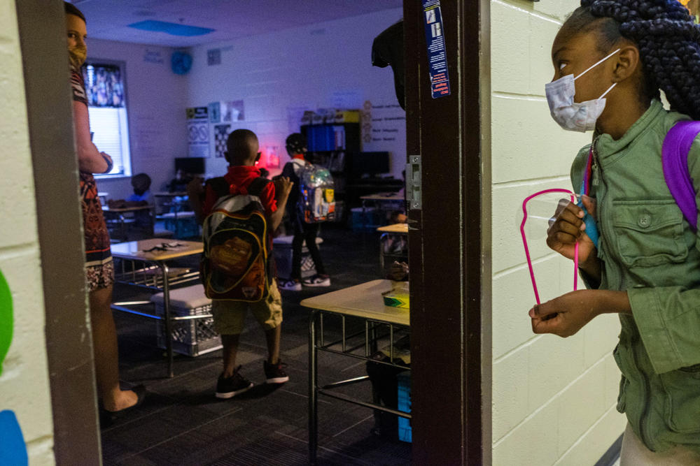 Students return for in-person classes on Nov. 9, 2020 at Ingram Pye Elementary in Macon, Ga. They went virtual again a few weeks later. 