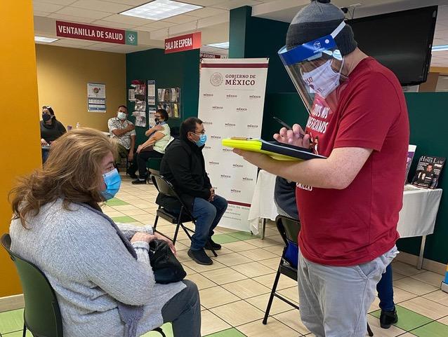 Members of the Latino community waiting for vaccines in Whitfield County