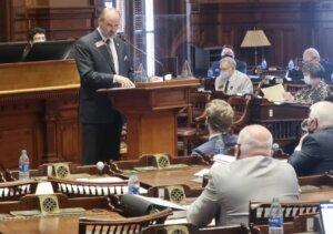 Voting overhaul point man state Rep. Barry Fleming made his closing argument to GOP House colleagues Thursday before they passed sweeping election changes. Hours later after fiery Senate speeches, the governor signed the legislation into law.
