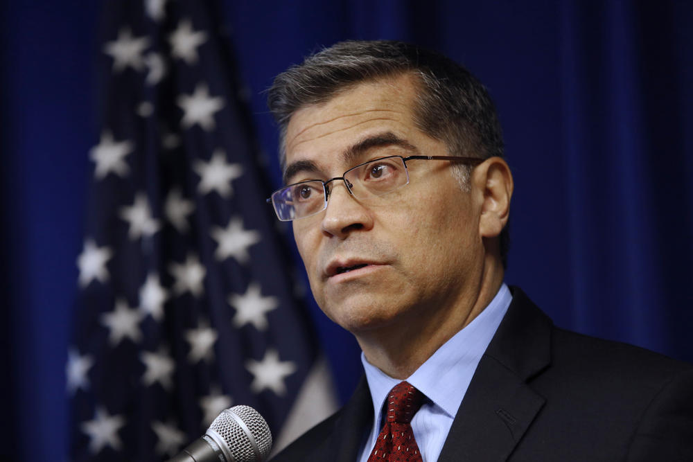 In this Dec. 4, 2019, file photo, Xavier Becerra speaks during a news conference in Sacramento, Calif. 
