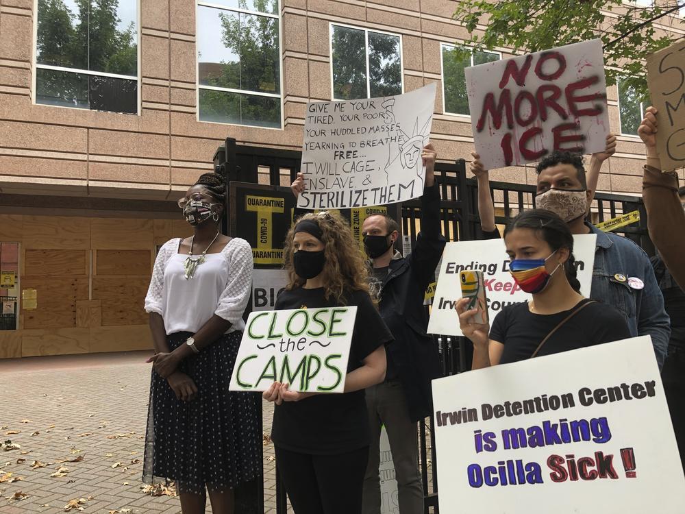 Dawn Wooten (left), who filed the whistleblower complaint about conditions at the Irwin County Detention Center, participates in a news conference on Sept. 16, 2020.