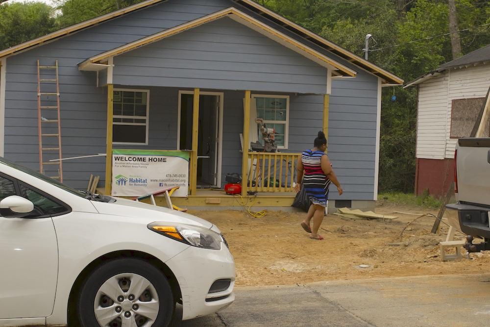 New homeowner Whitney Johnson said she is grateful for all of the students helping build her Habitat house. It's the first Habitat project for Bibb County School's YouthBuild program.