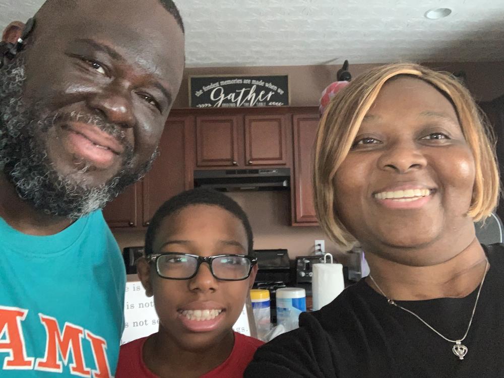 From left: Dwayne Tremble, son (adopted from foster care last year) Javontae Wright-Tremble and mother Mae Wright-Tremble.