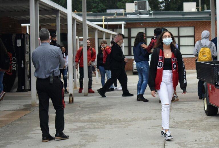 Students walk to class at Forsyth Central High School in August, 2020. The Georgia Board of Education is set to consider a proposal condemning the teaching of critical race theory in Georgia classrooms.