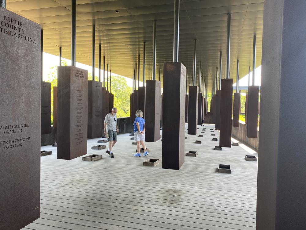 Visitors at the National Memorial for Peace and Justice in Montgomery, Ala.