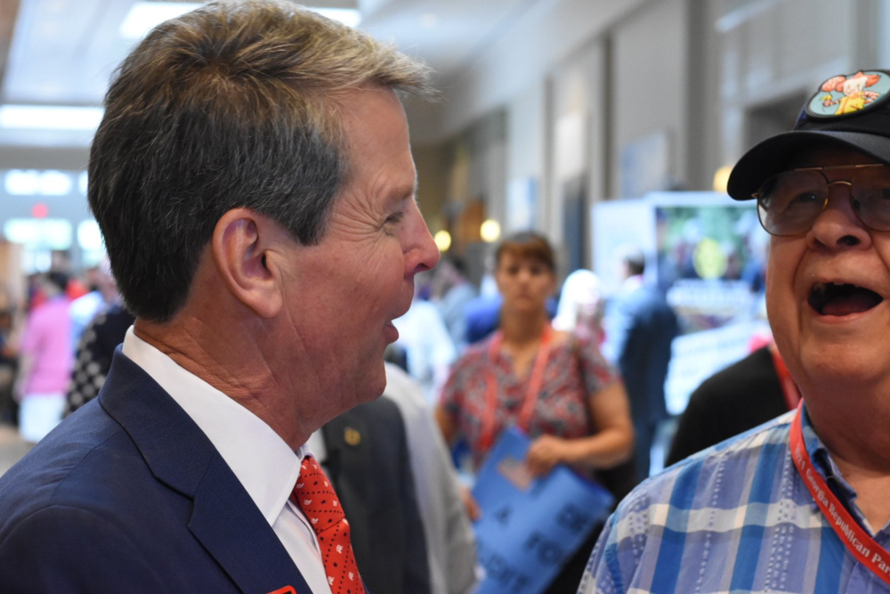 Brian Kemp speaks to convention-goers at the GOP state convention.