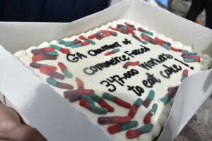 Demonstrators wished Labor Commissioner Mark Butler a not-so-happy birthday.