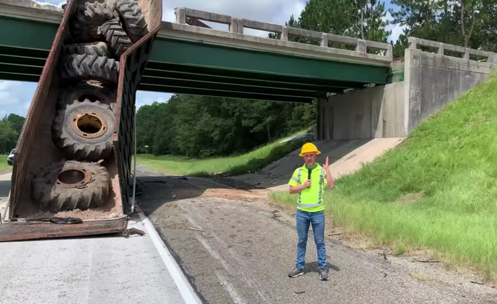 A Georgia Department of Transportation worker explains that the plan is to tear the bridge down due to massive structural damage. (Georgia Department of Transportation)