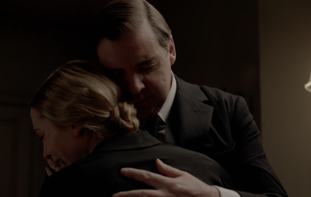 Anna and Bates embrace. 