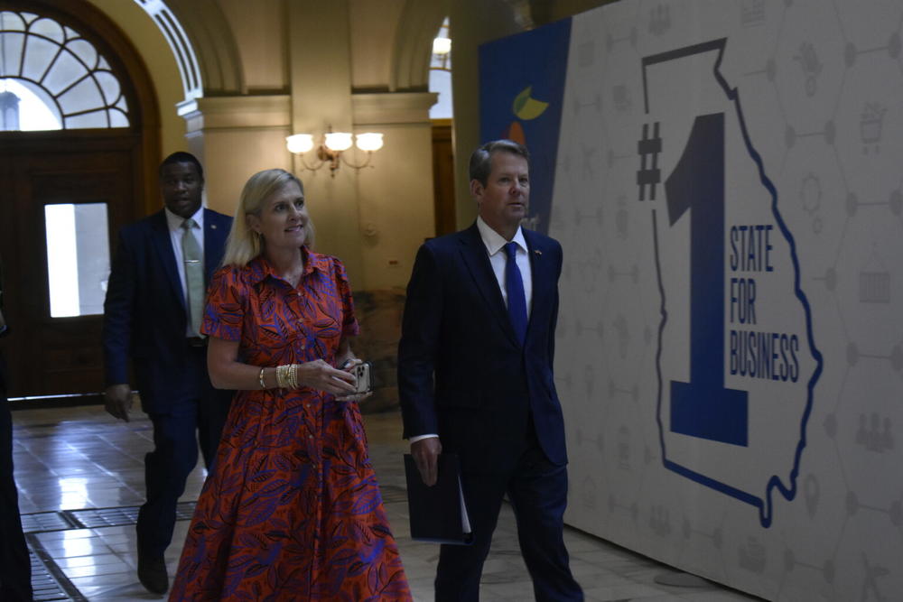  Gov. Brian Kemp and first lady Marty Kemp enter the Capitol Monday. On Thursday, Kemp signed an executive order aimed at protecting local businesses from local COVID-19 restrictions.