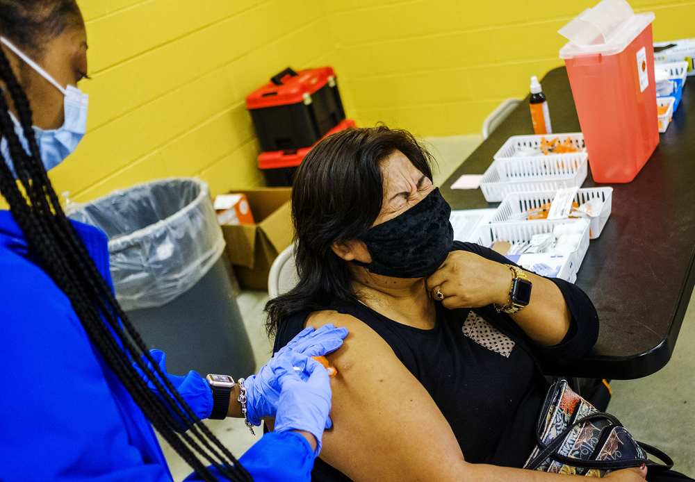 A vaccination during a pop up run by the non-profit group CORE in Macon recently.