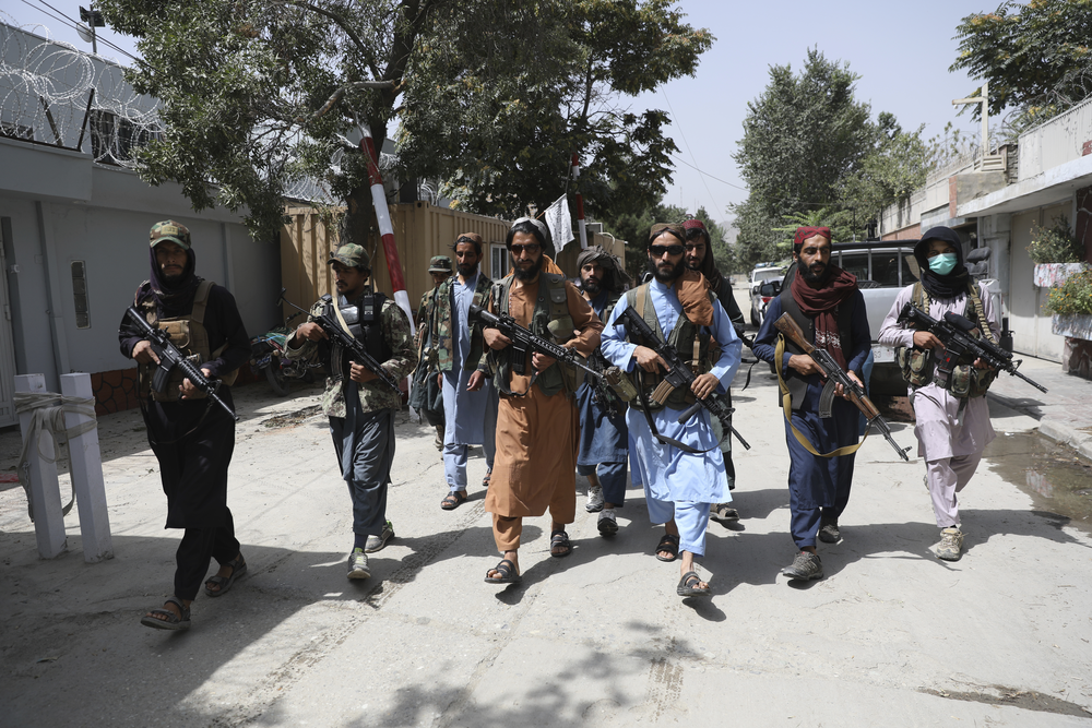 Taliban fighters patrol Kabul