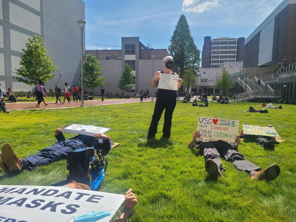 People gathered on a lawn at Georgia State University Thursday Sept. 9.
