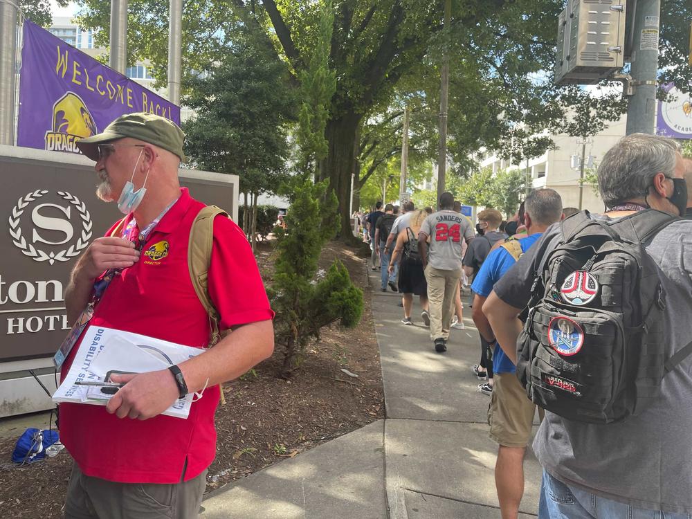 Attendees line up Thursday, Sept. 2, 2021, for Dragon Con 2021.