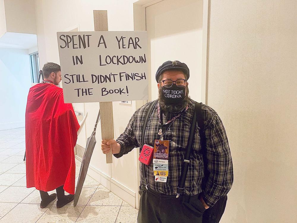 A cosplayer dressed as Game of Thrones author George R.R. Martin at Dragon Con 2021.