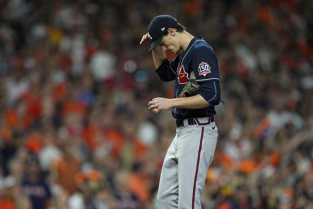 Atlanta Braves starting pitcher Max Fried reacts after giving up a two-run single by Houston Astros' Martin Maldonado during the second inning in Game 2 of baseball's World Series between the Houston Astros and the Atlanta Braves Wednesday, Oct. 27, 2021, in Houston.