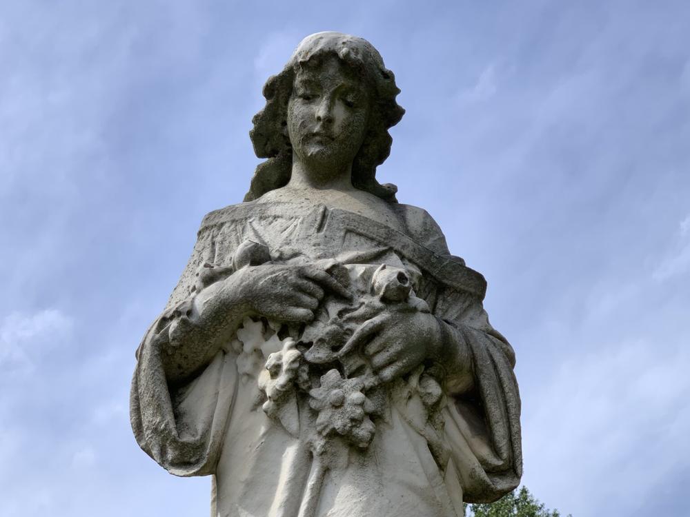As the story goes, Ida Bennett Bass may be one of Oakland Cemetery’s more restless residents. Pictured is the statue at Bass’ gravesite. 