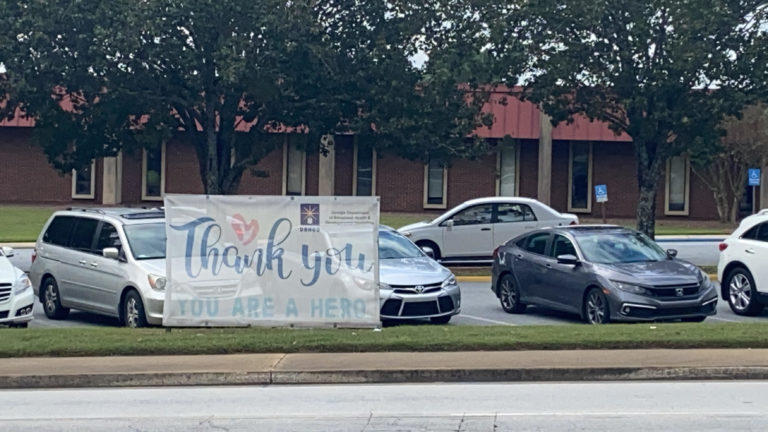A sign outside Georgia Regional Hospital Atlanta honors employees.