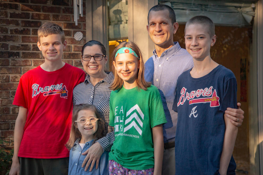 Jacob, Ellie, Michelle, Julia, Jeff and Xavier Chardos in their backyard in Columbus, Ga. on Nov. 2, 2021. The release of a pediatric vaccine signals an end to the family’s strict quarantine since the COVID-19 pandemic began. 