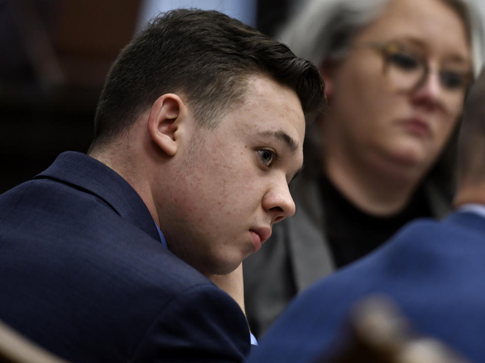 Kyle Rittenhouse listens as his attorney Mark Richards gives his closing argument during Rittenhouse's trial at the Kenosha County Courthouse on Nov. 15.