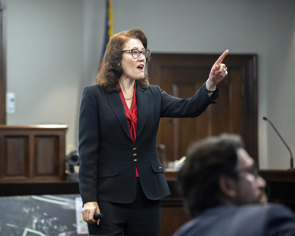 Prosecutor Linda Dunikoski presents a closing argument to the jury during the trial of Travis McMichael, his father, Gregory McMichael, and William "Roddie" Bryan, at the Glynn County Courthouse, Monday, Nov. 22, 2021, in Brunswick, Ga. 