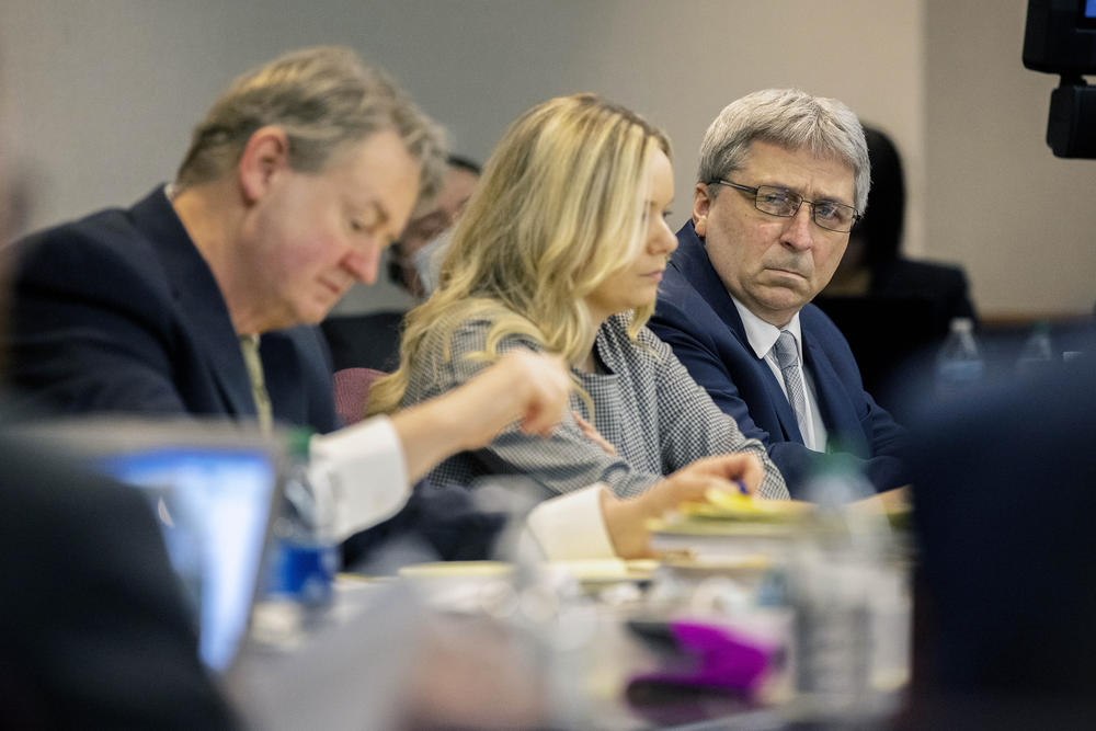 William "Roddie" Bryan, right, sits with his attorney's before the start of closing arguments to the jury during the trial of he, Travis McMichael, and his father Greg McMichael, at the Glynn County Courthouse, Monday, Nov. 22, 2021, in Brunswick, Ga. 