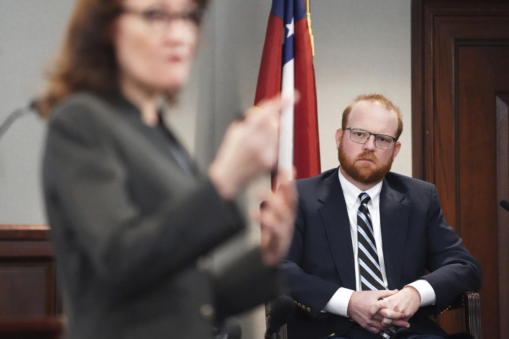 Defendant Travis McMichael testifies under cross-examination by prosecutor Linda Dunikoski at the Glynn County Courthouse on Thursday, Nov. 18, 2021 in Brunswick, Ga.