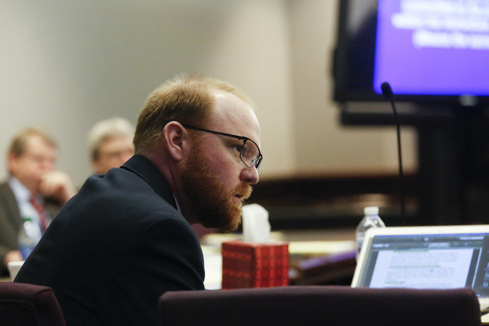 Defendant Travis McMichael looks on during his trial and of William "Roddie" Bryan and Gregory McMichael, charged with the February 2020 death of 25-year-old Ahmaud Arbery, at the Glynn County Courthouse in Brunswick, Ga., Tuesday, Nov. 23, 2021. 