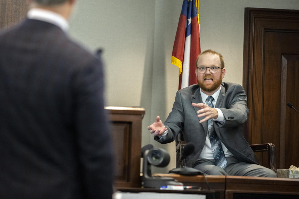 Travis McMichael speaks from the witness stand during his trial Wednesday, Nov. 17, 2021, in Brunswick, Ga. 